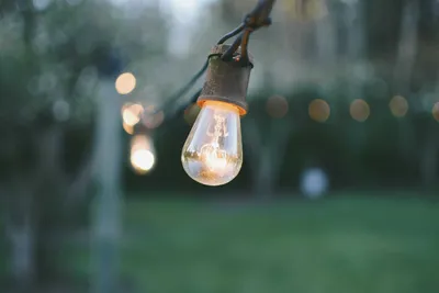 Solar wall lights mounted on an exterior brick wall