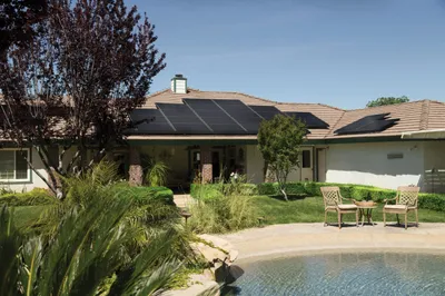 House with a full rooftop solar panel installation