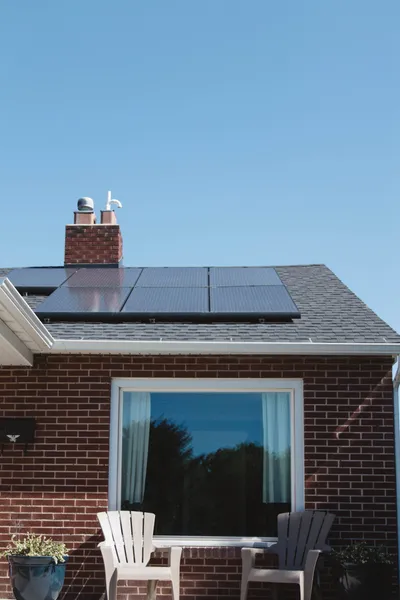 Homeowner reviewing solar sizing calculations on a tablet