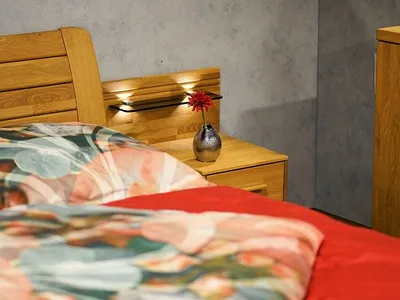 Solar bedside lamp glowing softly in a bedroom