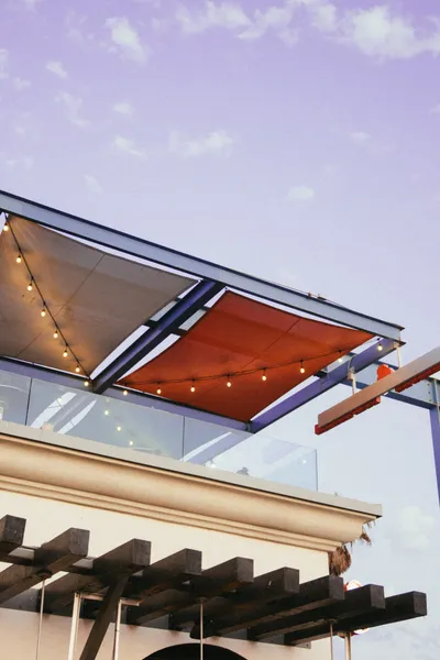 Solar fabric canopy providing shade at an outdoor event