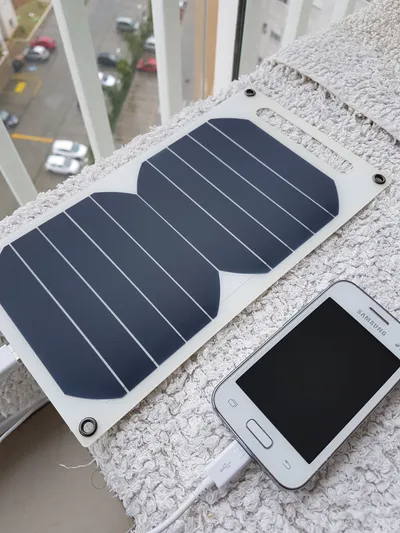 Solar power bank charging in direct sunlight