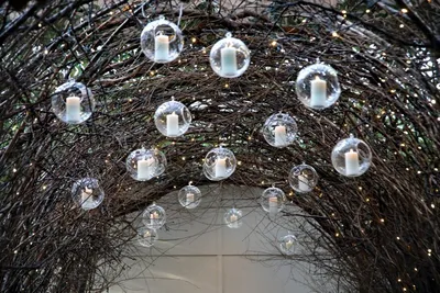 Solar powered outdoor candles flickering on a patio table