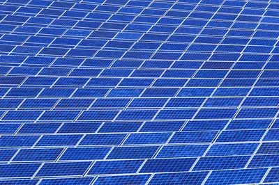 Automated solar panel assembly line inside a large-scale manufacturing facility