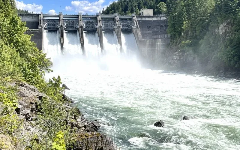 Water rushing through the spillway of a hydroelectric dam
